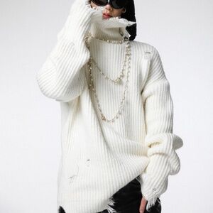 Ripped White knitted turtleneck sweater